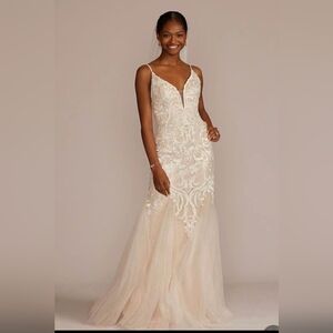 New with tags size 14 wedding dress from David's Bridal